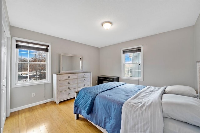 bedroom with light hardwood / wood-style flooring