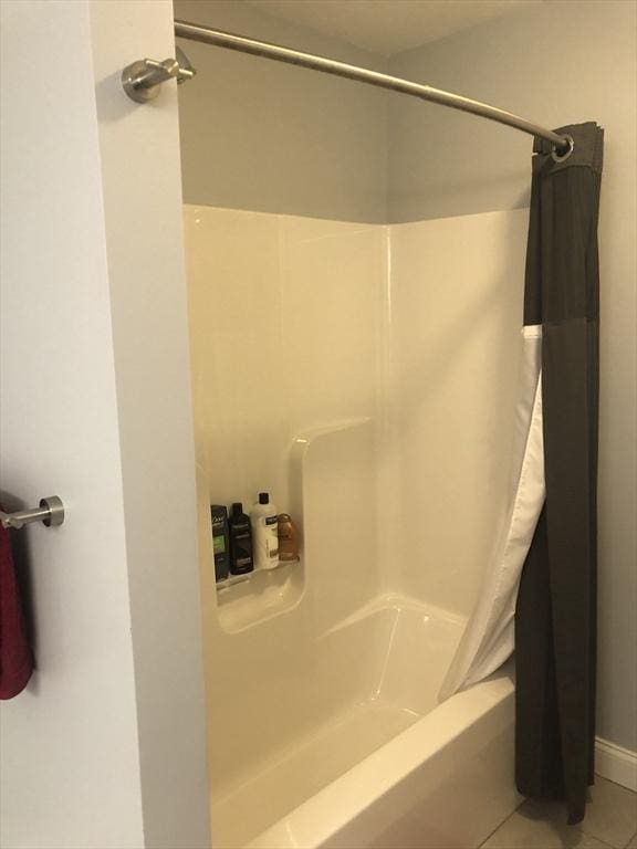 full bathroom with tile patterned flooring