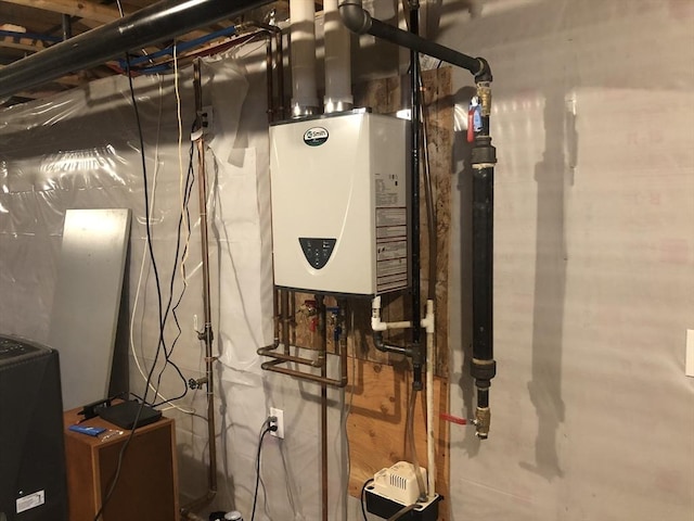 utility room with tankless water heater