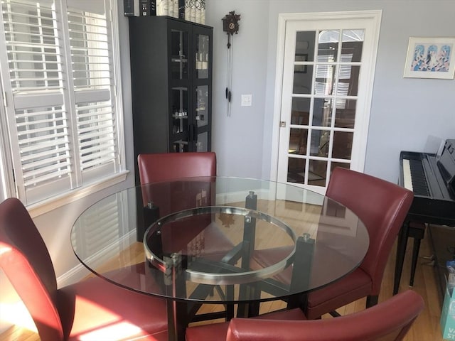 dining space with baseboards