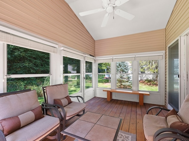 sunroom with vaulted ceiling and ceiling fan