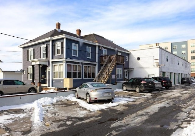 view of front of property featuring a chimney