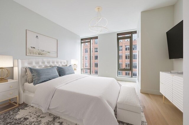 bedroom featuring light hardwood / wood-style floors