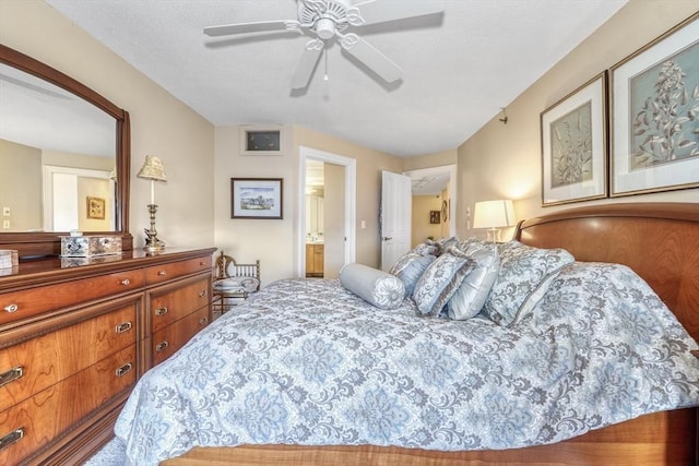 bedroom with ceiling fan and ensuite bathroom