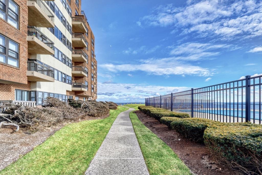 view of home's community with a water view