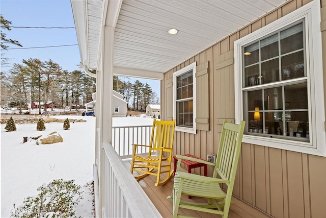 view of snow covered deck