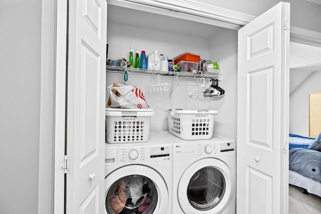 washroom featuring independent washer and dryer