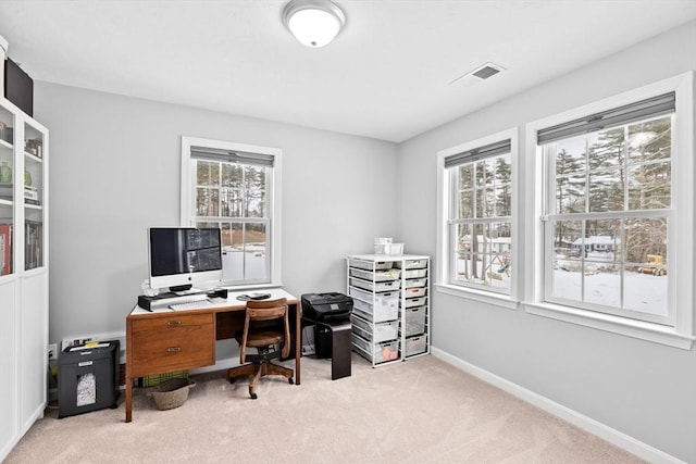 carpeted office featuring plenty of natural light