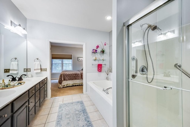 31 Fox Holw, Plymouth, MA 02360 - ensuite bathroom featuring tile patterned flooring, a stall shower, a garden tub, and double vanity