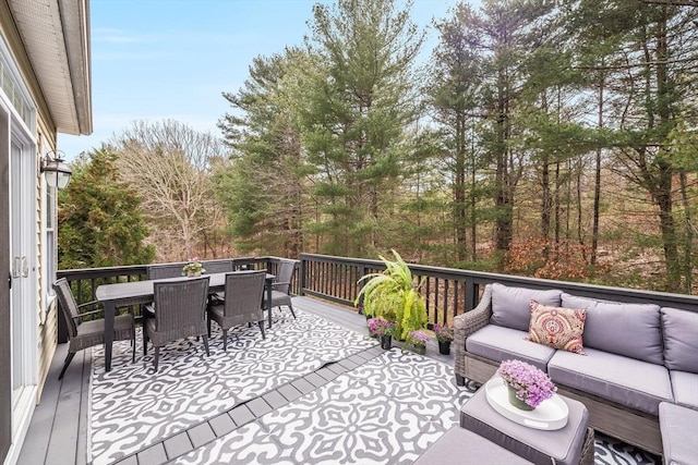 31 Fox Holw, Plymouth, MA 02360 - wooden deck with outdoor dining area and an outdoor living space