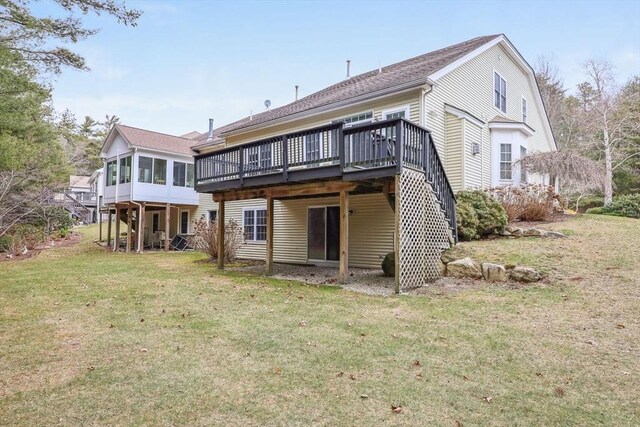 31 Fox Holw, Plymouth, MA 02360 - back of house with a wooden deck, a lawn, roof with shingles, and stairs