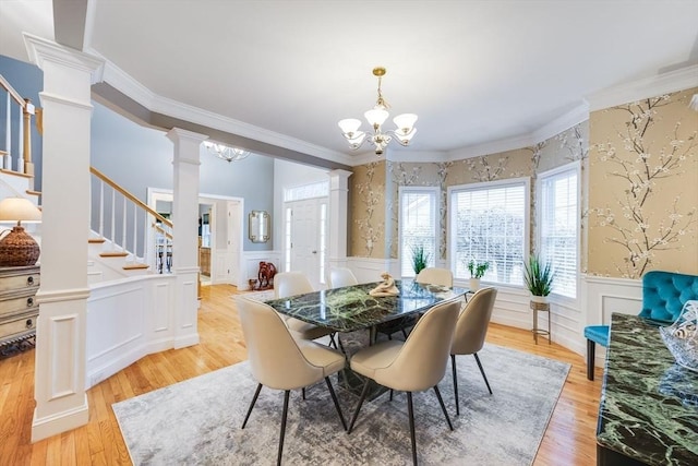 31 Fox Holw, Plymouth, MA 02360 - dining area with stairway, decorative columns, wainscoting, a chandelier, and a decorative wall