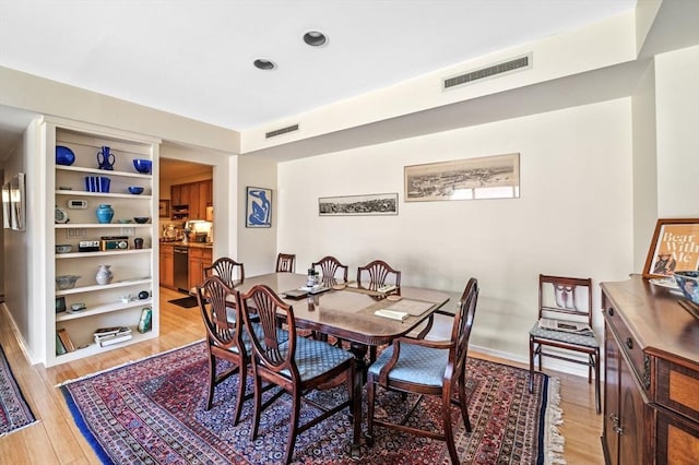 130 Mount Auburn St Unit 204, Cambridge, MA 02138 - dining area featuring light wood-type flooring and recessed lighting