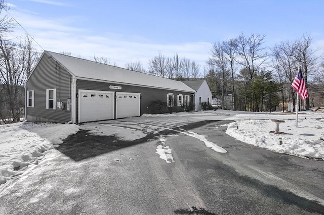 exterior space with a garage