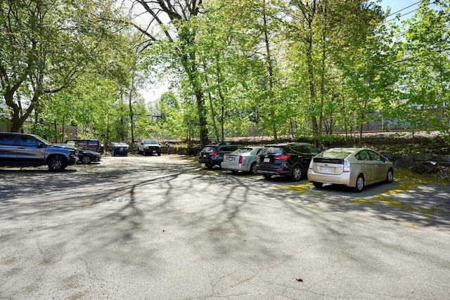 uncovered parking lot with fence