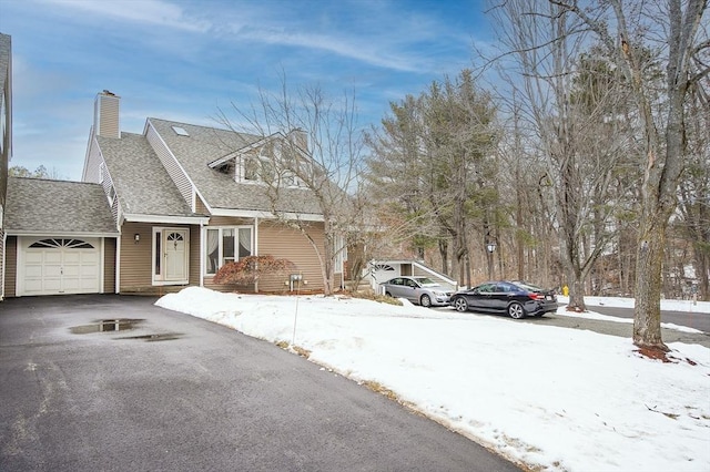 exterior space with a garage