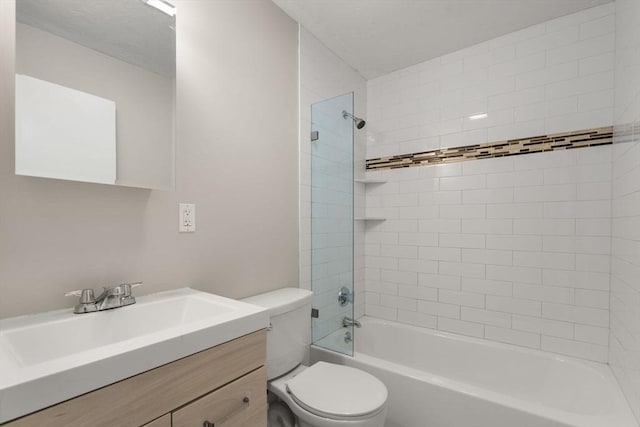 full bathroom featuring toilet, bathtub / shower combination, and vanity
