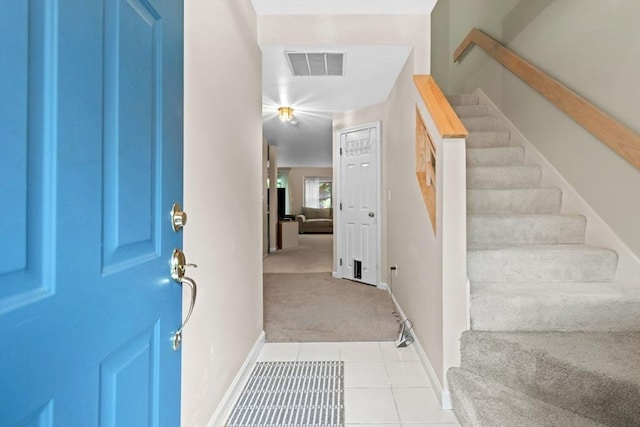 29 Crystal Brook Way Unit C, Marlborough, MA 01752 - entrance foyer featuring light carpet, stairs, and light tile patterned floors