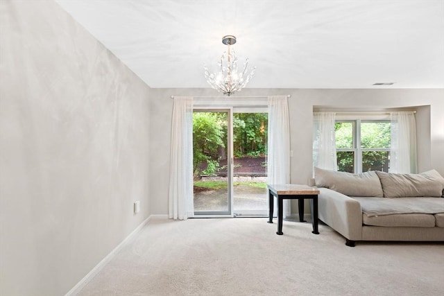 29 Crystal Brook Way Unit C, Marlborough, MA 01752 - living area featuring carpet floors and a chandelier