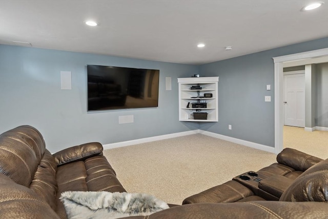 living room featuring recessed lighting, baseboards, and carpet floors