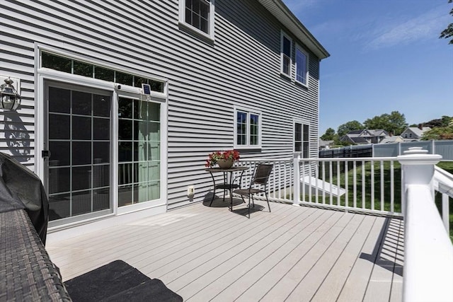 deck with grilling area and fence