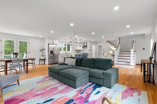 21 Pembrook Rd, North Andover, MA 01845 - living room with plenty of natural light, light wood-type flooring, recessed lighting, and stairway