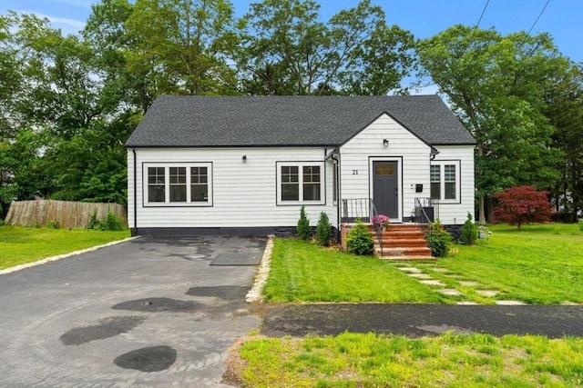 21 Pembrook Rd, North Andover, MA 01845 - view of front of home featuring roof with shingles and asphalt driveway
