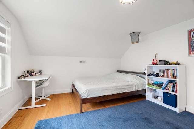 21 Pembrook Rd, North Andover, MA 01845 - bedroom with lofted ceiling and wood finished floors