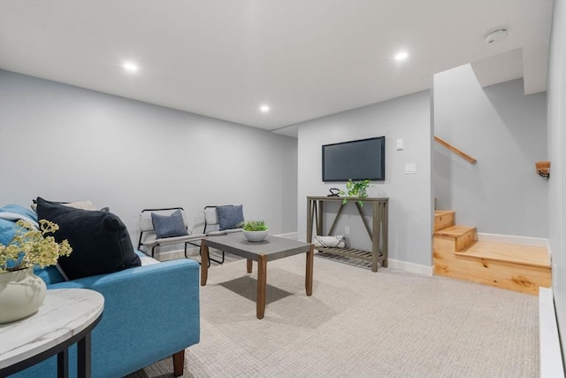living room with recessed lighting, carpet floors, baseboards, and stairs