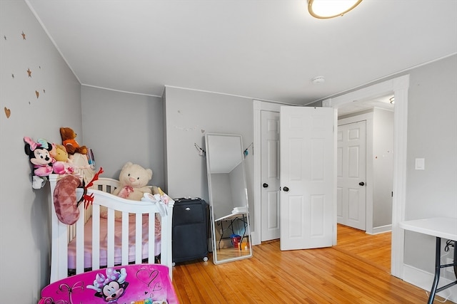 bedroom featuring hardwood / wood-style floors