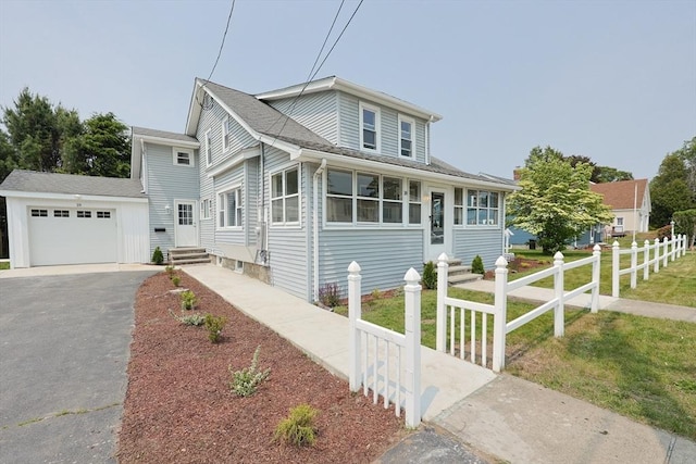 18 Beaumont Rd, Worcester, MA 01604 - view of front of house with asphalt driveway, a garage, and a shingled roof