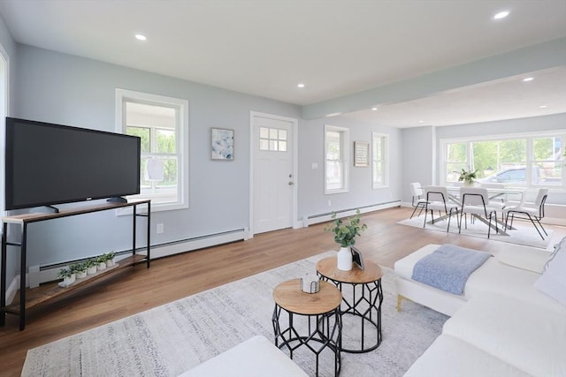 18 Beaumont Rd, Worcester, MA 01604 - living room featuring a baseboard radiator, wood finished floors, recessed lighting, and baseboards