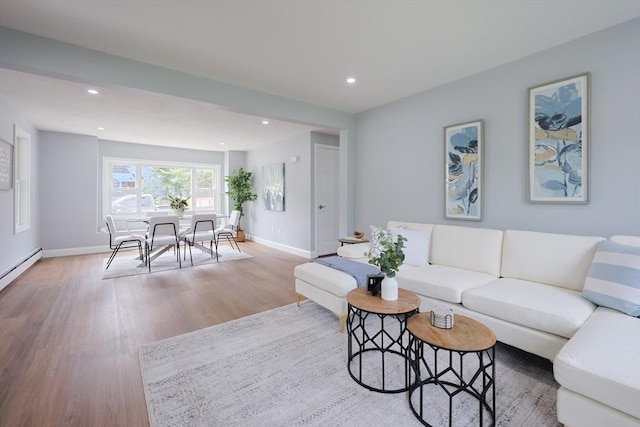18 Beaumont Rd, Worcester, MA 01604 - living room featuring wood finished floors, baseboards, recessed lighting, and baseboard heating