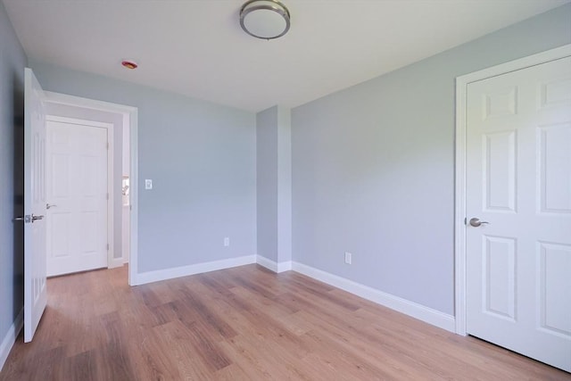 18 Beaumont Rd, Worcester, MA 01604 - unfurnished room featuring wood finished floors and baseboards