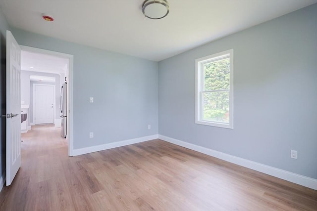 18 Beaumont Rd, Worcester, MA 01604 - unfurnished room featuring light wood-style flooring and baseboards