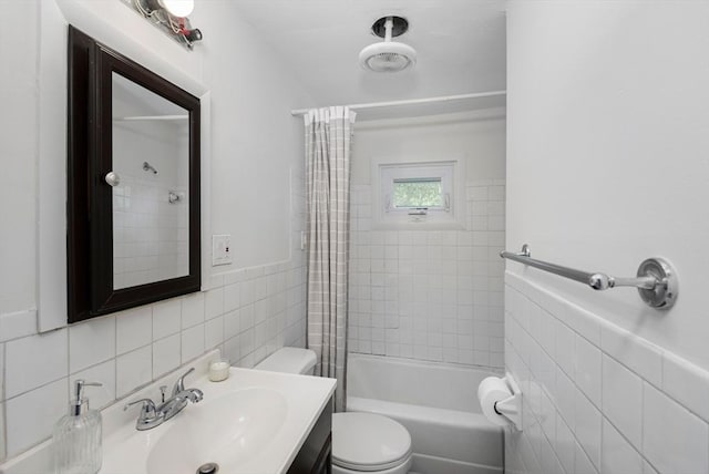 147 Fairmount Ave, Lynn, MA 01905 - full bathroom with tile walls, vanity, and shower / bathtub combination with curtain