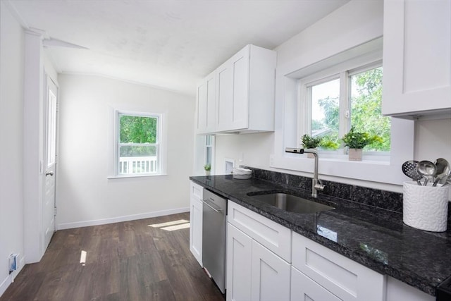 147 Fairmount Ave, Lynn, MA 01905 - kitchen with dishwasher, dark wood-type flooring, white cabinets, and dark stone counters
