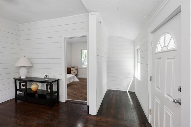 147 Fairmount Ave, Lynn, MA 01905 - foyer with hardwood / wood-style flooring, wood walls, and ornamental molding