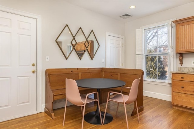 dining area featuring light hardwood / wood-style flooring