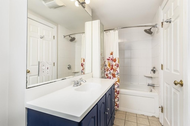 bathroom featuring tile patterned flooring, vanity, and shower / bathtub combination with curtain