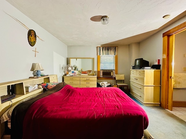 bedroom featuring carpet and cooling unit