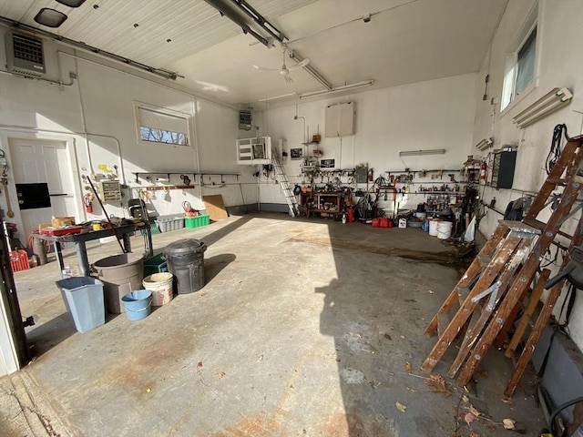 garage with a workshop area