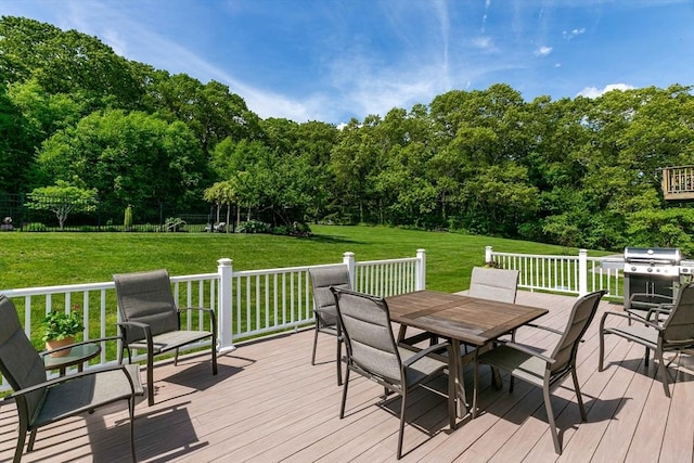 27 Southwick Rd, Sutton, MA 01590 - deck featuring outdoor dining area, a lawn, and a grill