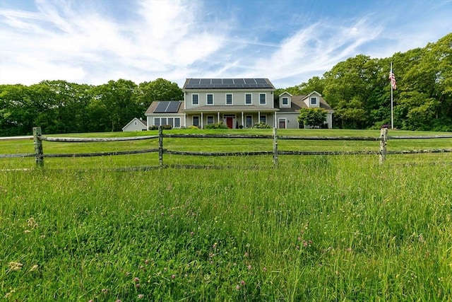 27 Southwick Rd, Sutton, MA 01590 - view of front facade featuring roof mounted solar panels and a rural view
