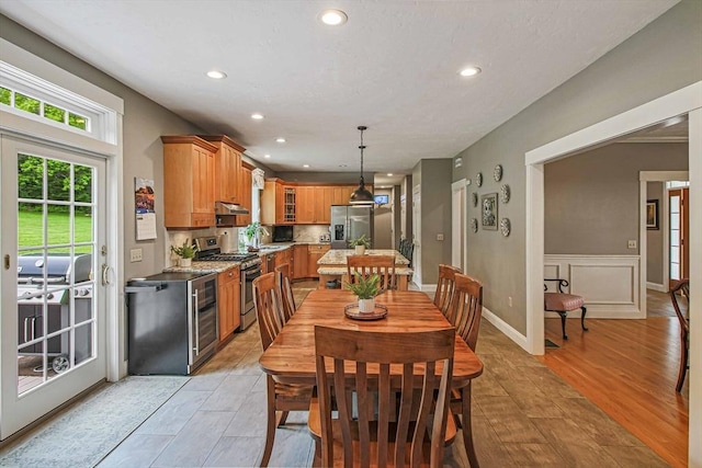 27 Southwick Rd, Sutton, MA 01590 - dining area featuring recessed lighting, light wood finished floors, and beverage cooler