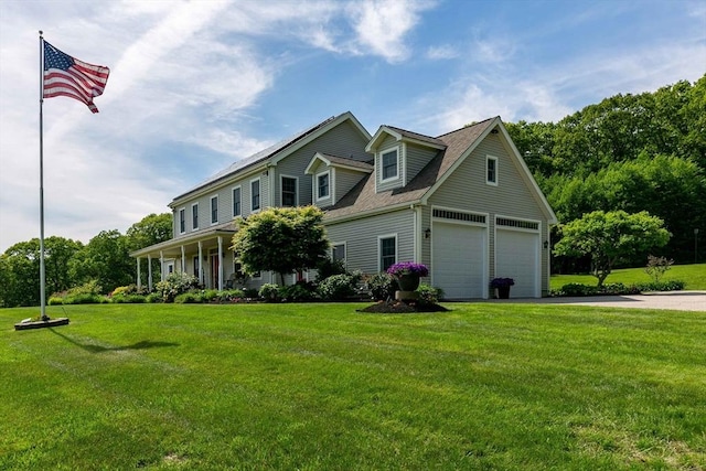 27 Southwick Rd, Sutton, MA 01590 - view of front of property with a garage, a front yard, and asphalt driveway