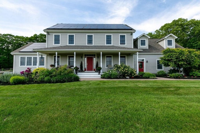 27 Southwick Rd, Sutton, MA 01590 - view of front of house with a porch, a front yard, and solar panels