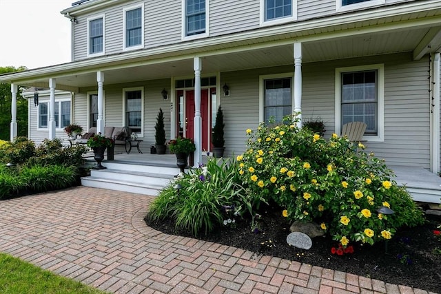 27 Southwick Rd, Sutton, MA 01590 - doorway to property with a porch