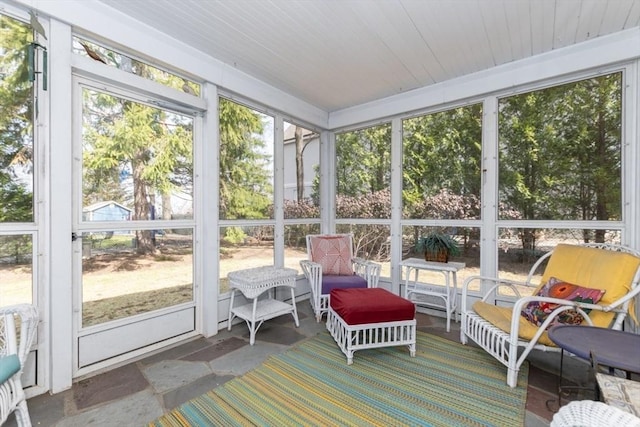 sunroom featuring plenty of natural light