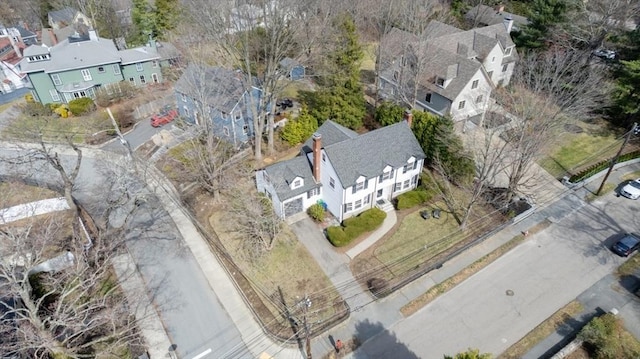 birds eye view of property with a residential view